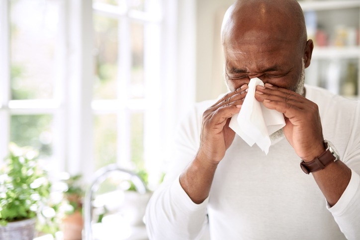 Man Sneezing Due To Pollen